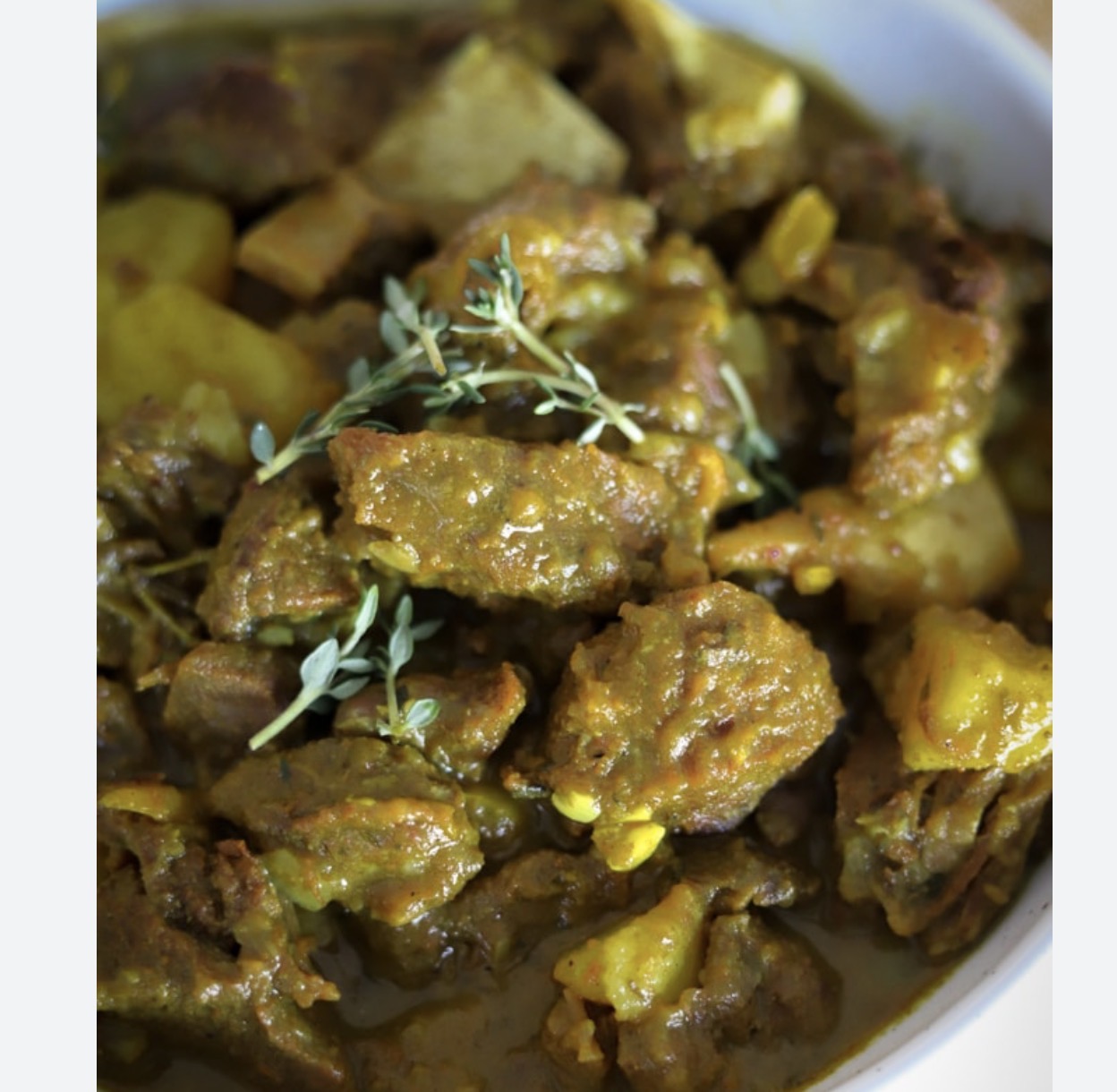 CURRY GOAT